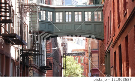 New York City Staple street skybridge. Industrial architecture, red brick building. Manhattan, USA. New York City Staple street skybridge. Industrial architecture, red brick building. Manhattan, USA. 121968687