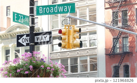 Broadway street road sign, Manhattan midtown architecture, New York City. Traffic signage of 23 st. 121968826