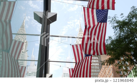 New York, american flag waving. Chrysler building. Manhattan midtown city street banner, patriotism. 121968840