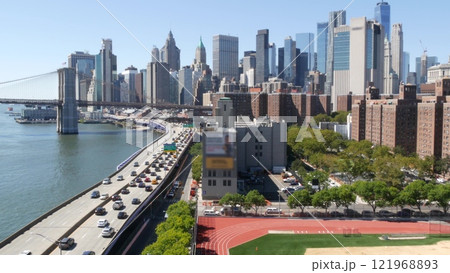 Brooklyn Bridge from Manhattan Bridge. New York City downtown skyline, financial district cityscape. Brooklyn Bridge from Manhattan Bridge. New York City downtown skyline, financial district cityscape. 121968893