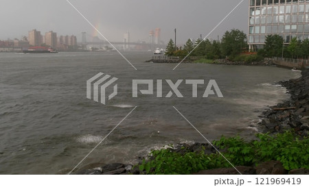 Rainy New York City under Manhattan Bridge, Brooklyn. Rainbow, Williamsburg bridge view from Dumbo. 121969419