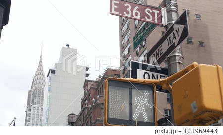 New York City crossroad, street intersection road sign on post. Chrysler building, Midtown corner. 121969443