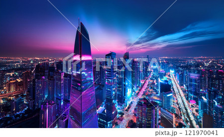 A city skyline at night with a purple sky 121970041