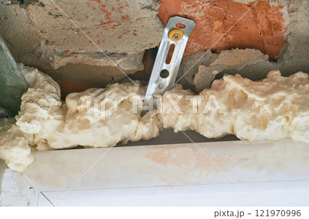 Construction mounting aluminum metal strips. Windows,poly foam Construction mounting aluminum metal strips. Windows,poly foam 121970996