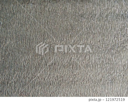 foil soft material for food packaging application or heat preservation and light reflection, silver textured background of aluminum material with ribbed surface foil soft material for food packaging application or heat preservation and light reflection, silver textured background of aluminum material with ribbed surface 121972519