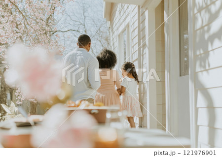 Group of friends enjoying summer outdoor meal, concept of togetherness 121976901