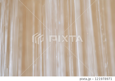 Abstract texture of water jets from the shower in close-up. Abstract texture of water jets from the shower in close-up. 121978971