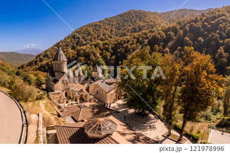 Aerial view of Medieval Haghartsin monastery complex 11th century on sunny summer day. Ancient church popular touristic destinations. Armenian attractions near Dilijan. Tavush Province, Armenia Europe Aerial view of Medieval Haghartsin monastery complex 11th century on sunny summer day. Ancient church popular touristic destinations. Armenian attractions near Dilijan. Tavush Province, Armenia Europe 121978996
