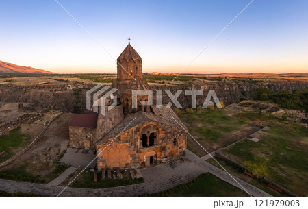 Aerial view of Hovhannavank monastery and Ohanavan village. Mount Ara, medieval church and Kasakh gorge and river canyon on sunny autumn sunset. Aragatsotn Province, Armenia. Europe. 121979003