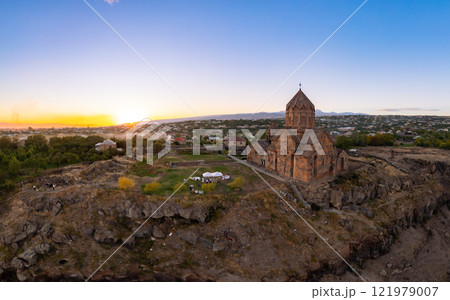 Aerial view of Hovhannavank monastery and Ohanavan village. Mount Ara, medieval church and Kasakh gorge and river canyon on sunny autumn sunset. Aragatsotn Province, Armenia. Europe. 121979007