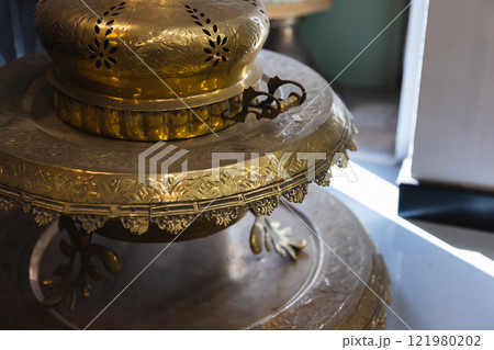 An ancient incense burner is in antique shop An ancient incense burner is in antique shop 121980202