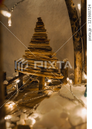 Handmade Wooden Christmas Nativity Scene with Lights and Pine Tree Festive Holiday Decor and Warm Wishes. High quality photo 121980724