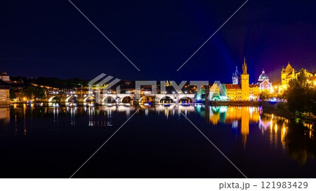 Panoramic view of Prague at night with the Charles Bridge and Prague Castle illuminated 121983429
