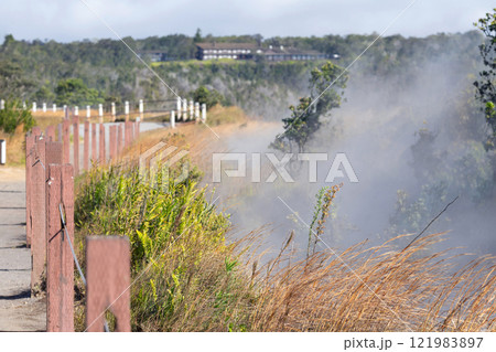 Fenced trail along the volcano sulfur steam vents. Fenced trail along the volcano sulfur steam vents. 121983897