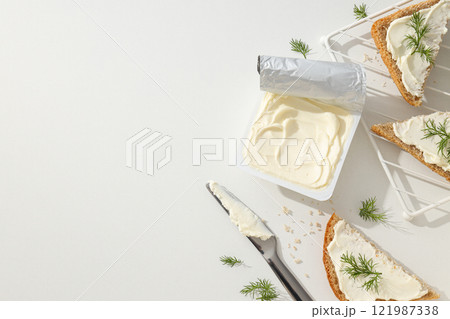 Sandwiches with Philadelphia cheese on a light background. Sandwiches with Philadelphia cheese on a light background. 121987338
