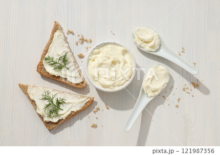 Sandwiches with Philadelphia cheese on a light background. Sandwiches with Philadelphia cheese on a light background. 121987356