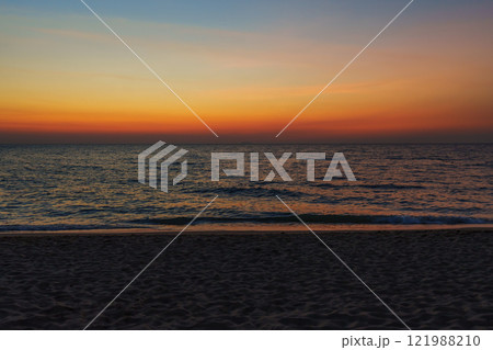 Na Jomtien beach at sunset in Pattaya, Thailand Na Jomtien beach at sunset in Pattaya, Thailand 121988210