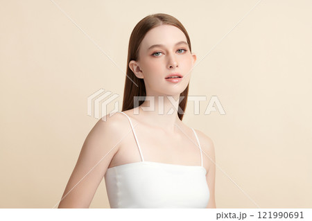Beautiful young woman with clean fresh skin on beige background, Face care, Facial treatment, Cosmetology, beauty and spa, women portrait. Beautiful young woman with clean fresh skin on beige background, Face care, Facial treatment, Cosmetology, beauty and spa, women portrait. 121990691