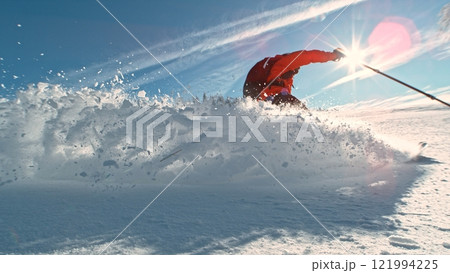 Free Ride Skier Running Down the Hill. Freeze Motion. Powder Snow Exploding. 121994225