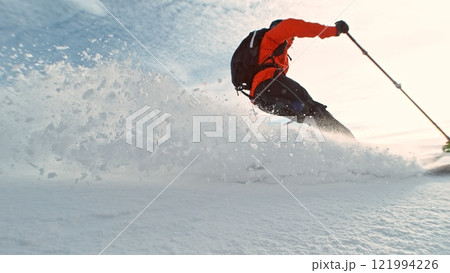 Free Ride Skier Running Down the Hill. Freeze Motion. Powder Snow Exploding. 121994226