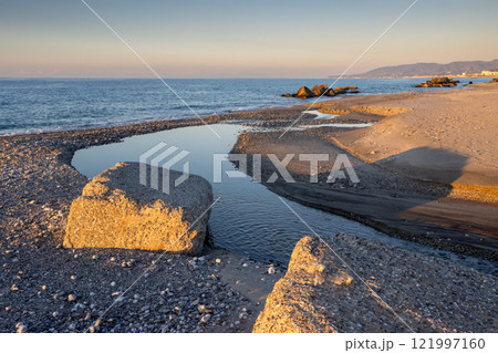 Beach with a small river, Spadafora, Sicily, Italy 121997160