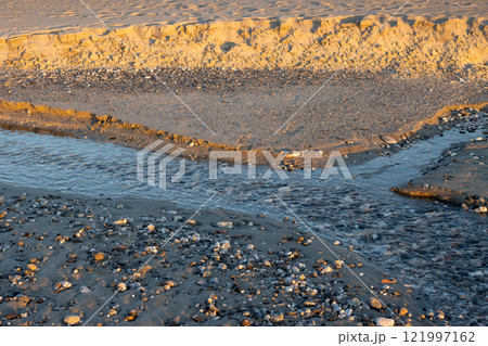 Detail of a beach with small river, Spadafora, Sicily, Italy Detail of a beach with small river, Spadafora, Sicily, Italy 121997162