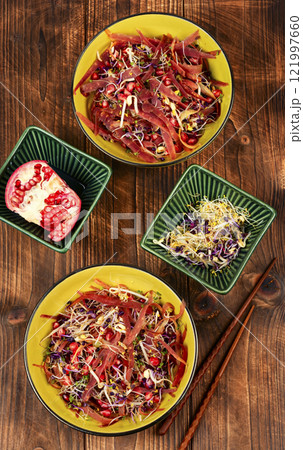 Sprouts and pomegranate salad. Sprouts and pomegranate salad. 121997660