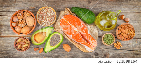 Foods high in fatty acids including vegetables, seafood, nut and seeds. Healthy fats, clean eating for weight loss. top view 121999164