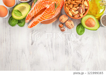 Food sources of omega 3 and omega 6 on white background top view Food sources of omega 3 and omega 6 on white background top view 121999165