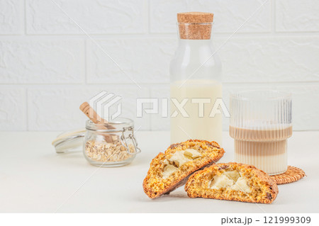 Homemade tasty oatmeal cookies with cream cheese filling. Healthy snack concept. copy space 121999309