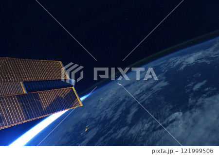 A space satellite above the Earth's surface. Elements of this image furnished by NASA 121999506