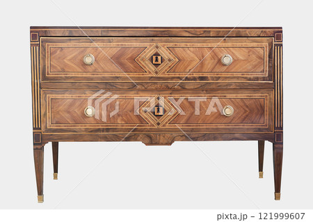 Wooden chest of drawers with inlaid design isolated 121999607