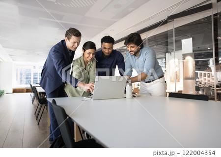 Diverse creative team working on online project together 122004354