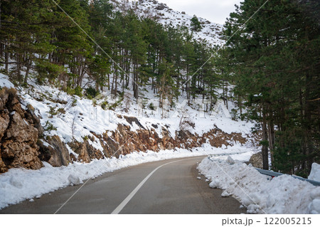 View of mountain road in winter time in Montenegro, Lovcen national park View of mountain road in winter time in Montenegro, Lovcen national park 122005215