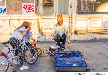 Crowds of people walking across a busy crosswalk at the intersection . High quality photo Crowds of people walking across a busy crosswalk at the intersection . High quality photo 122006674