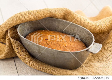 Fresh Bread on a Wooden Board 122006949