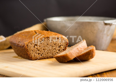 Fresh Bread on a Wooden Board 122006956