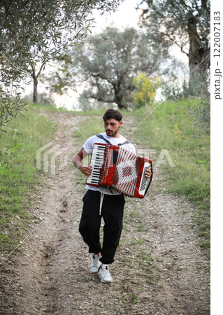Music Sounds From Accordion In The Green Field Music Sounds From Accordion In The Green Field 122007183
