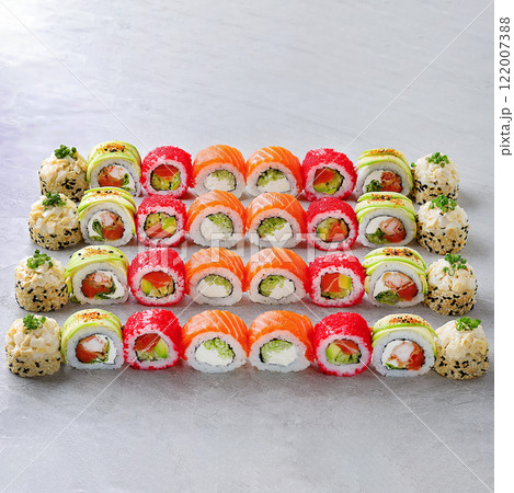 Japanese sushi rolls, sushi sets on a gray background for restaurant menu and food delivery 122007388