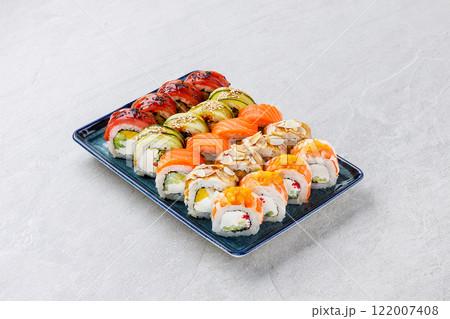 Japanese sushi rolls, sushi sets on a gray background for restaurant menu and food delivery 122007408