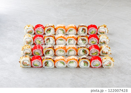 Japanese sushi rolls, sushi sets on a gray background for restaurant menu and food delivery 122007428