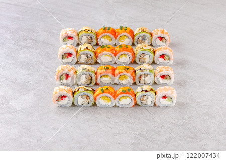 Japanese sushi rolls, sushi sets on a gray background for restaurant menu and food delivery 122007434