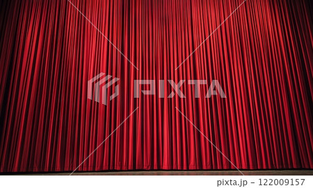 Red stage curtain closed in theater setting, anticipation and drama concept Red stage curtain closed in theater setting, anticipation and drama concept 122009157