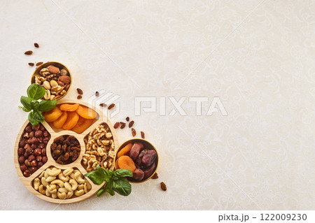 Concept of the Jewish holiday Tu Bishvat. Dried Fruits and Nuts Arrangement. Concept of the Jewish holiday Tu Bishvat. Dried Fruits and Nuts Arrangement. 122009230