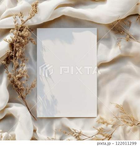 Boho styled blank white paper invitation card mockup, stationery template, natural organic beige decor with dried plants and flowers, real sunlight and soft shadows 122011299
