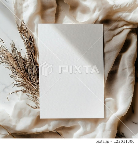 Boho styled blank white paper invitation card mockup, stationery template, natural organic beige decor with dried plants and flowers, real sunlight and soft shadows 122011306