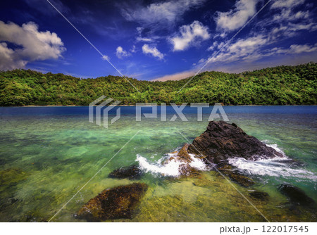 View of the sea from the beach of Coconut Island Kilian Bay View of the sea from the beach of Coconut Island Kilian Bay 122017545