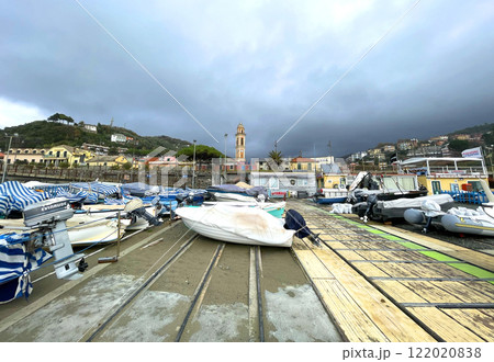 Boats in marina covered with covers. Fishing and season. Sea and lifestyle.  122020838