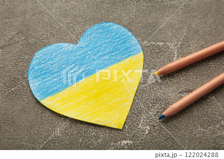 Heart pattern, yellow-blue flag of Ukraine. revention of hostilities in Ukraine. Peace concept. No war, stop war, russian aggression. 122024288
