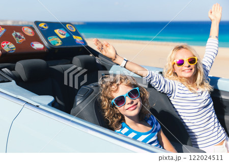 Happy family travels by car on summer vacation Happy family travels by car on summer vacation 122024511